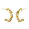 ELICA Gold: Zirconia Embedded Hoop Earrings with Ornate Detail &  Crisscross Accents
